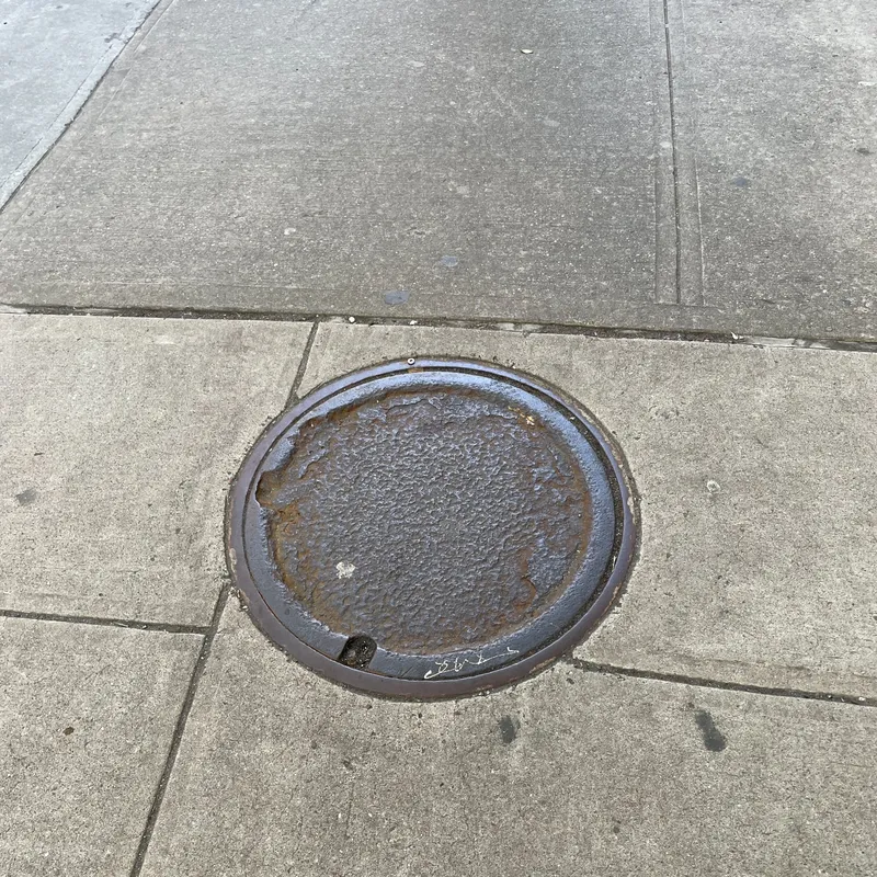 Manhole cover in New York City, United States