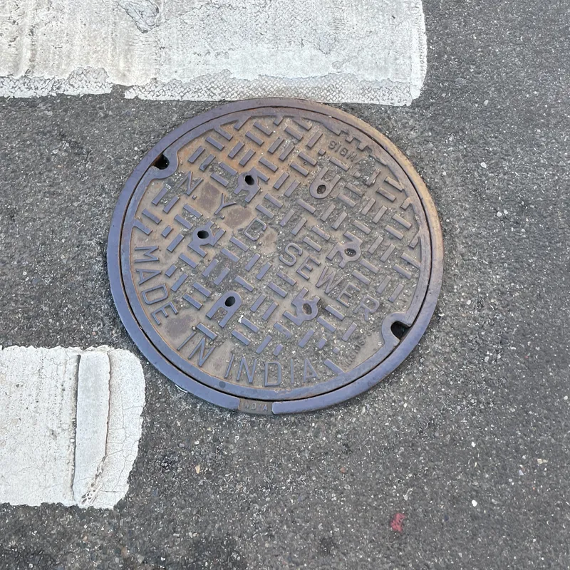 Manhole cover in New York City, United States