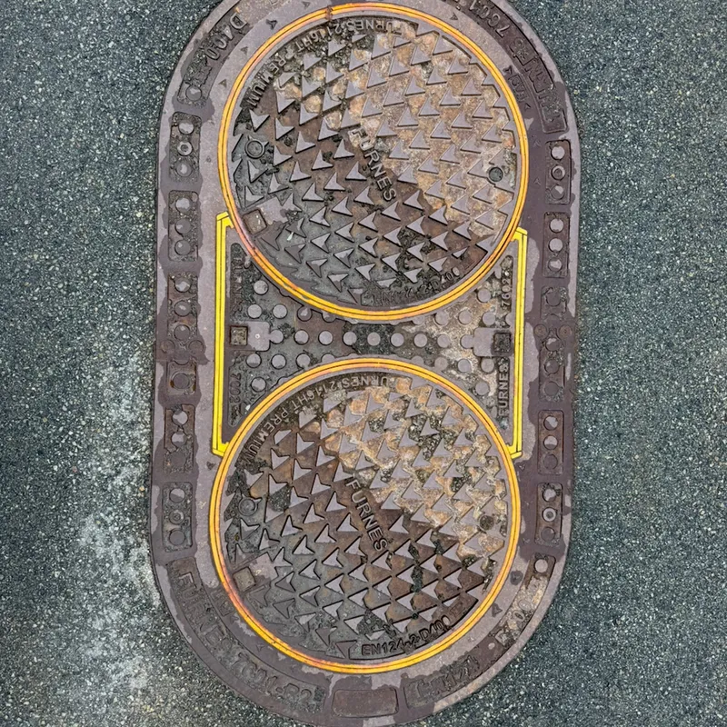 Manhole cover in Kjenn, Norway